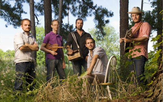 a group of people with instruments 