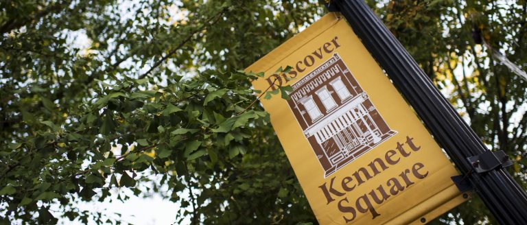 yellow banner on street light pole