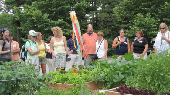 group of people standing in a row outside
