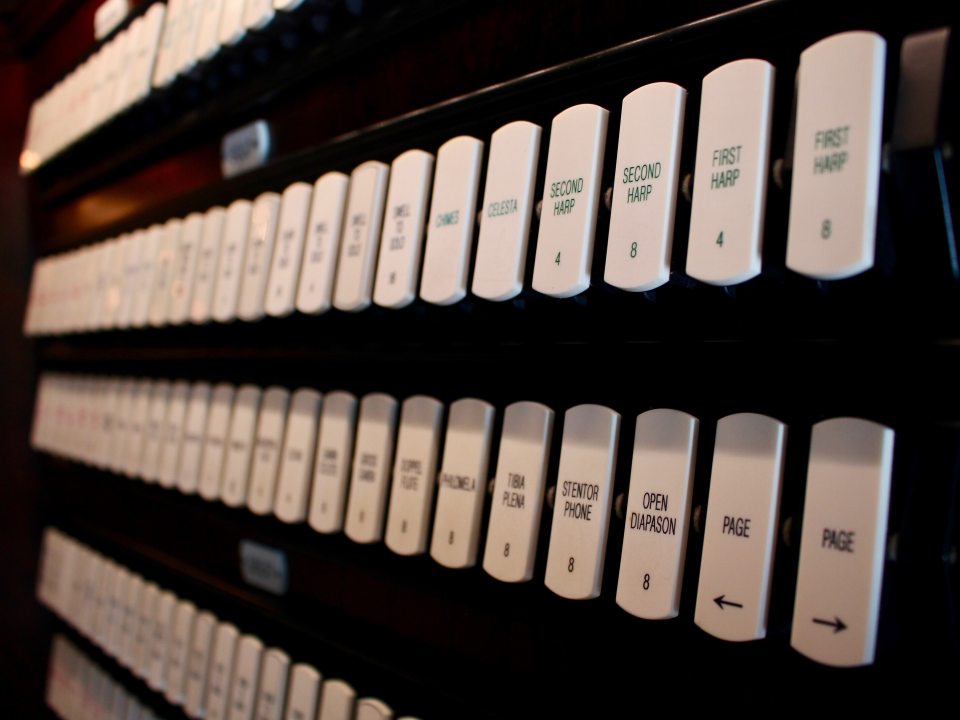 a close up of organ keys