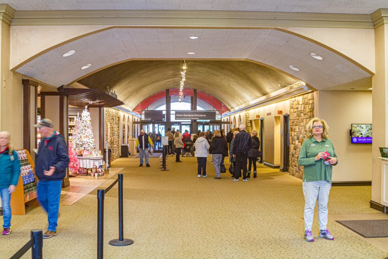 indoor visitor center with people standing around